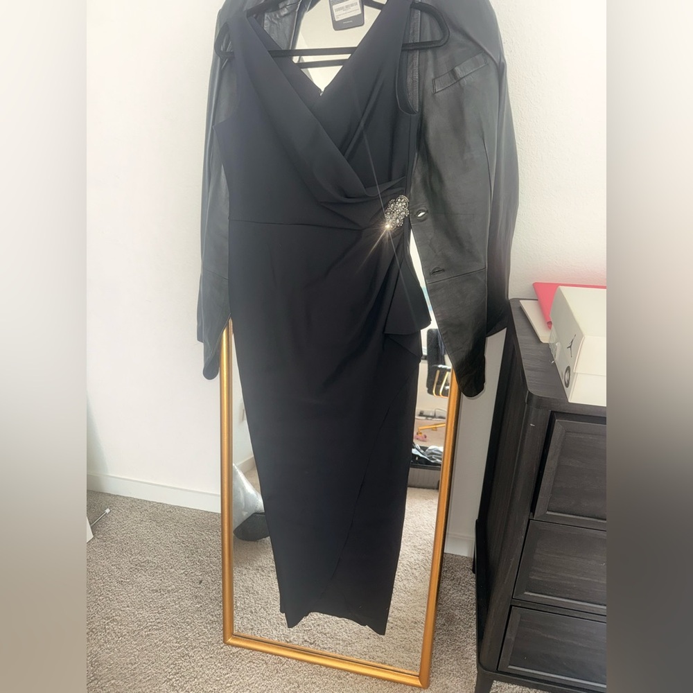 Elegant Black Dress with Embellished Detail